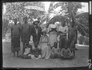 Missionary with wife and domestic staff, Antioka, Mozambique, ca. 1901-1907