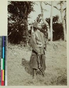 Malagasy soldier in uniform carrying a rifle, Madagascar