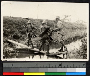 Chinese soldiers crossing a brook, Shanghai, Shanghai Shi, China, 1937