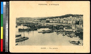 Boats in a harbor and a port city, Algeria, ca.1920-1940