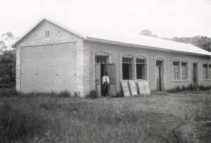 Reverend Rakotozafy in front of the school in Ambodiriana, Madagascar