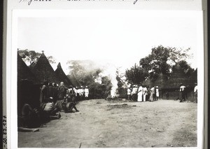 Burning down a hut in Nkikok, Bakosu, where magic was practised. A choir of christians sings songs of victory