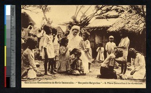 Missionary sister reading to children at play, Madagascar, ca.1900-1930