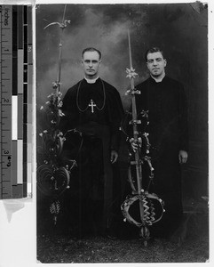 Bishop Foley and Reverend Killion with ornamental palms, Philippines, ca. 1900-1920