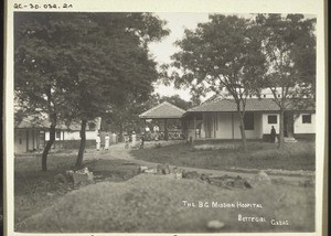 "Mission hospital in Bettigeri (India) with neighbouring buiuldings."