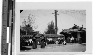 Group working in Maryknoll Sisters Convent garden, Peng Yang, Korea, ca. 1920-1940