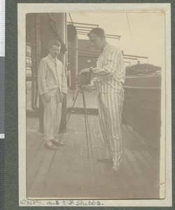 Goddard and Stubbs taking a photograph, Indian Ocean, July 1917