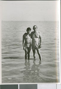 This is a typical baptism scene. We baptize in the sea and usually wear bathing suits or 'swimming costumes' as they call them here