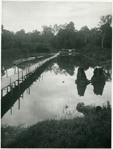 Landing stage in Aruh Napoleas, VII. 32 (if it's high tide everything is under water and you can drive right to the back with a rowing boat). On the river bank (in the front at the river) ist the 'Marimba'. Photo taken from land. -