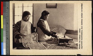 Girls with finished lace pieces, China, ca.1920-1940