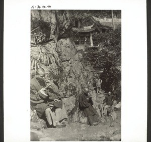 Buddhist monks in the monastery garden