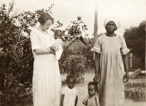 Emily Godfrey with hospital staff and children, Nigeria, ca. 1933