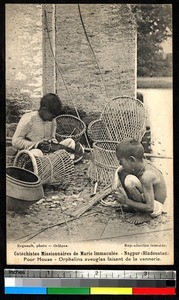 Orphan boys making baskets, Nagpur, India, ca.1920-1940