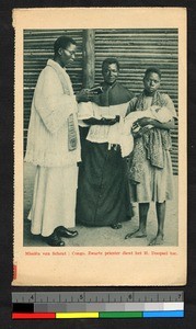 Indigenous priest with mother and child, Congo, ca.1920-1940