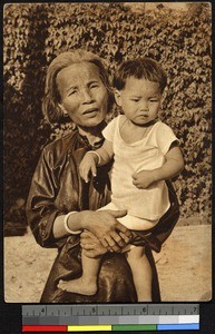 Grandmother and grandson, China, ca.1920-1940