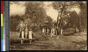 European schoolgirls posing outdoors in their red capes, Lubumbashi, Congo, ca.1920-1940