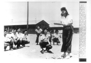 "Evacuee Jap Girls Keep Ball Team--All members of the Chick-a-dee Japanese girls' soft ball team were evacuated to this war relocation authority center from Los Angeles"--caption on photograph