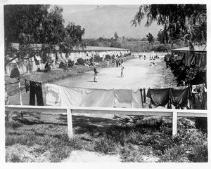 "General view of Japanese internment camp at Santa Anita Race Track. With removal of the Nipponese the Army will utilize the camp, thus preventing hoped for renewal of racing."--caption on photograph