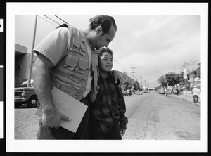 Man with arm around boy, Los Angeles, 1999