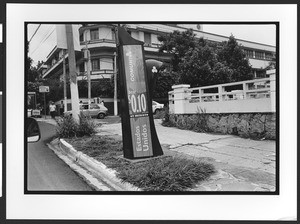 Street scene with telephone booth, downtown San Salvador