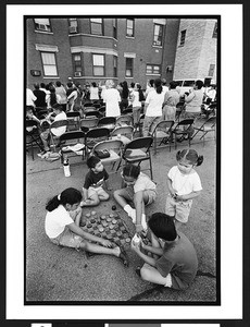 Worshipers of Latin American origin at outdoor prayer meeting, Charismatic, Maternity B.V.M., Chicago, Il. July 17, 2002