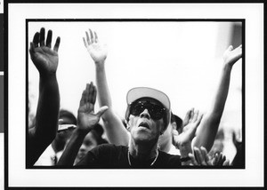 Man praying at West Angeles Church of God in Christ, 1996