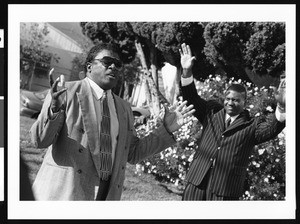 Man preaching on the street with a listener, Los Angeles, 1999