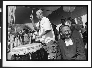 Young man of Vietnamese origin playing traditional Vietnamese drums at Our Lady of Peace, San Jose, California, 2002