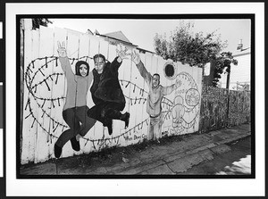 Mural of young people in an alley way, Mission District, San Francisco, California, 2002