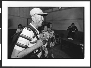 Man of Chinese origin with his family. He was detained at Angel Island Internment Camp, Angel Island, San Francisco, California, 2003