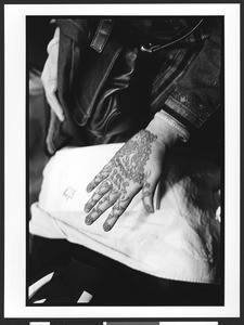 Hand of a Muslim woman painted with sacred designs, before prayers at EID celebration, D.C. Convention Center, Washington, D.C., 2002