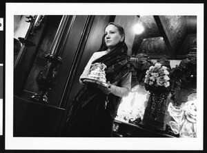 Woman with Hindu religious article, Los Angeles, 1999