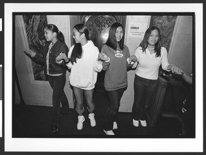 Four teen age girls of Filipino origin, Saint Patrick's Catholic Church, San Francisco, California, 2002