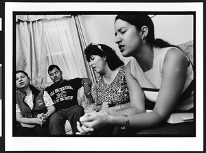 Prayer group sponsored by the Church of God, with people of South American origin, in a private home, Richmond, California,2002