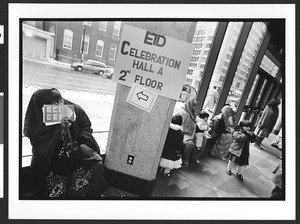 Women, children, & signs at entrance to D.C. (District of Columbia) Convention Center, Washington, DC., 2002