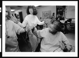 Two elderly women holding hands, Los Angeles, 1999