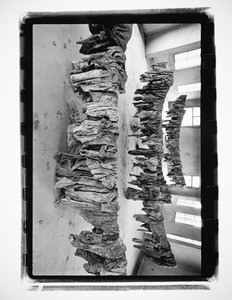 Clothing of victims hanging at a genocide memorial site, Rwanda, 2004