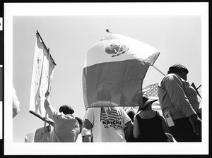 Mexican flag waving in what appears to be procession, Oriental, Los Angeles, 1996