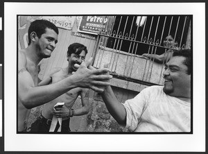 Drunken men, of Hispanic origin, downtown, San Salvador
