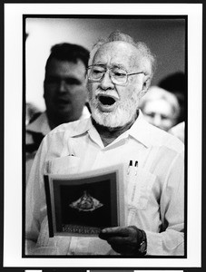 Man singing at Ermita de la Caridad (La Ermita), Miami, Florida, 2002