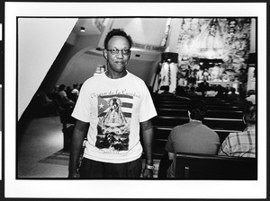 Man at a mass, Ermita de la Caridad (La Ermita), Miami, Florida, 2002