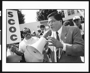 Miguel Contreras with megaphone in front of procession, Industrial Areas Foundation, Los Angeles, 1996