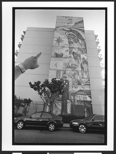 Mural on the side of an apartment building depicting Filipino immigration history, SOMA, San Francisco, California, 2002