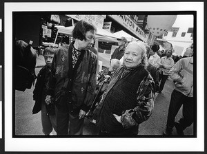 Three people of Chinese origin on Sacramento Street, Chinatown, San Francisco, California, 2002