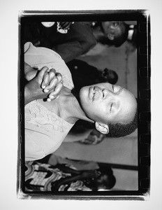 Woman praying, Rwanda, 2004