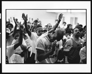 People in prayer at the West Angeles Church of God in Christ, 1996