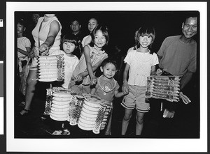 4 children of Vietnamese origin with lanterns, Harvest Moon Festival, Tet Trung Thu, San Jose, California, 2002