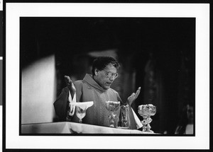 Priest on Palm Sunday at St. Vincent Catholic Church (Los Angeles, Calif.), 1996