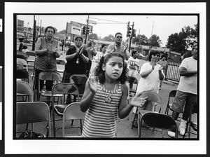 Worshipers of Latin American origin at outdoor prayer meeting, Charismatic, Maternity B.V.M., Chicago, Il., 2002