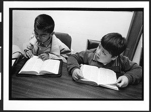 Two young boys in bible reading class, First Church of God, San Francisco, California, 2002